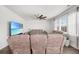 Cozy living room featuring neutral decor and a large TV at 320 Blue Shadows Ct, Summerville, SC 29486