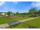 Community playground featuring modern play equipment and a safe, fenced area for children to enjoy at 320 Blue Shadows Ct, Summerville, SC 29486