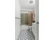 Bathroom with a shower/tub combo, patterned floors, and a functional vanity with storage at 3249 Stonehaven Dr, North Charleston, SC 29420