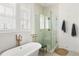 Elegant bathroom featuring a freestanding tub, walk-in shower, and chic fixtures for a spa-like experience at 3305 Knot Aly, Johns Island, SC 29455