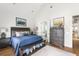 Comfortable bedroom featuring neutral colors, soft textures, and natural light. Includes a connecting bathroom at 3305 Knot Aly, Johns Island, SC 29455
