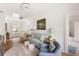Bright living room with modern furnishings, hardwood floors, and lots of natural light at 3305 Knot Aly, Johns Island, SC 29455