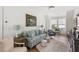 Inviting living room featuring modern furnishings, hardwood floors, and natural light at 3305 Knot Aly, Johns Island, SC 29455