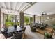 Relax on this screened porch, perfect for entertaining with comfortable seating and beautiful outdoor views at 3305 Knot Aly, Johns Island, SC 29455