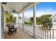 Relax and enjoy the outdoors on this covered porch with comfortable seating and serene neighborhood views at 3305 Knot Aly, Johns Island, SC 29455