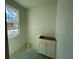 Bright bathroom awaiting finishing touches with white cabinet and natural light at 337 Trailmore Ln, Summerville, SC 29486