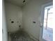 A clean, unfinished laundry room space with connections for washer and dryer at 337 Trailmore Ln, Summerville, SC 29486