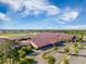 Aerial view of school featuring well-maintained architecture, ample parking, and lush landscaping at 342 Saxony Loop, Summerville, SC 29486