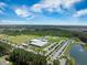 Community recreational center featuring sports fields, tennis courts, a playground, parking, and a small lake at 342 Saxony Loop, Summerville, SC 29486