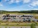 Aerial view of a commercial building with a large parking lot, situated in a well-maintained business park at 342 Saxony Loop, Summerville, SC 29486