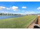 A gorgeous backyard view overlooking a large pond and neighborhood homes at 342 Saxony Loop, Summerville, SC 29486