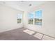 This comfortable bedroom has wall-to-wall carpet and view of the community pond at 342 Saxony Loop, Summerville, SC 29486