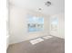 This cozy bedroom features plush carpeting and a window view of the water at 342 Saxony Loop, Summerville, SC 29486