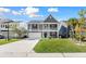 Charming two-story home with a well-manicured lawn and inviting front porch at 342 Saxony Loop, Summerville, SC 29486