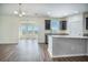 Bright kitchen featuring granite countertops and an open view to a large living area at 342 Saxony Loop, Summerville, SC 29486