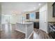 Bright, open kitchen featuring a center island, modern appliances, and hardwood floors at 342 Saxony Loop, Summerville, SC 29486
