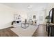 Spacious living room with modern decor, a comfortable sofa, and lots of natural light at 342 Saxony Loop, Summerville, SC 29486
