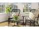 Cozy sitting area with natural light, accent chairs, and stylish decor creating an inviting atmosphere at 342 Saxony Loop, Summerville, SC 29486