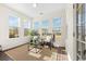 Cozy sunroom with large windows and comfortable seating at 342 Saxony Loop, Summerville, SC 29486