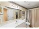 Bathroom featuring neutral color scheme, shower with curtain, and large white vanity at 420 Manorwood Ln, Charleston, SC 29414