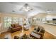 Open floor plan with bright natural light and hardwood flooring throughout at 420 Manorwood Ln, Charleston, SC 29414