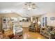 Open floor plan with bright natural light and hardwood flooring throughout at 420 Manorwood Ln, Charleston, SC 29414