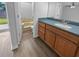 This bathroom features a jacuzzi tub, hard wood floors, and a large vanity at 4500 Winterwood Pl, Ladson, SC 29456
