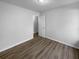 Clean bedroom with hardwood floors, ample natural light, and a calming atmosphere at 4500 Winterwood Pl, Ladson, SC 29456