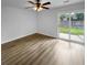 Bedroom with sliding glass door for backyard access with natural light at 4500 Winterwood Pl, Ladson, SC 29456