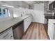 This kitchen features updated counter tops, hard wood floors, and stainless steel appliances at 4500 Winterwood Pl, Ladson, SC 29456