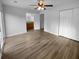 The main bedroom features hard wood floors, a walk in closet, and access to the main bathroom at 4500 Winterwood Pl, Ladson, SC 29456