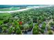 Aerial view of home in a lush community with a lake and Ashley River nearby at 5404 Red Fork Ln, North Charleston, SC 29420