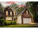 Beautiful two-story brick home featuring a two-car garage and landscaped front yard at 5404 Red Fork Ln, North Charleston, SC 29420