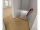 Carpeted stairway leading to the upper level with painted walls and natural light from the window at 5404 Red Fork Ln, North Charleston, SC 29420