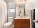 Powder room featuring a single sink vanity and a window at 541 Brick Barn Ln, Goose Creek, SC 29445