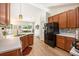 Well-lit kitchen area featuring stainless steel appliances and a view into the dining and living room at 541 Brick Barn Ln, Goose Creek, SC 29445