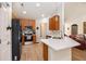 Modern kitchen features wood cabinets, stainless steel appliances, and ample counter space at 541 Brick Barn Ln, Goose Creek, SC 29445