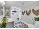 Chic bathroom featuring a glass-enclosed shower, modern fixtures, and decorative wall art at 718 Parish Rd, Charleston, SC 29407