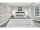 Serene bedroom featuring stylish decor, comfortable bedding, and natural light at 718 Parish Rd, Charleston, SC 29407