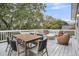 Expansive outdoor deck with dining table and seating area, perfect for entertaining and relaxing at 718 Parish Rd, Charleston, SC 29407