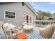 Cozy outdoor deck with comfortable seating and stylish decor, ideal for relaxing and unwinding at 718 Parish Rd, Charleston, SC 29407