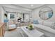Spacious living room with fireplace, comfortable seating, and an open layout to other living areas at 718 Parish Rd, Charleston, SC 29407