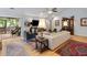 Bright living room with hardwood floors, neutral furnishings, and a sliding door to outdoor porch at 638 Stono Edge Dr, Charleston, SC 29412
