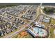An aerial view of a Primary-planned community showcasing single-Gathering homes, a pool, and community center at 716 Triangle Ln, Summerville, SC 29486