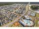 Community aerial view showcasing a resort-style pool and residential houses at 716 Triangle Ln, Summerville, SC 29486