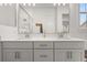 Modern bathroom featuring a glass-enclosed shower, double vanity with ample counter space, and contemporary fixtures at 716 Triangle Ln, Summerville, SC 29486