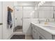 Modern bathroom featuring a glass-enclosed shower, double vanity, and contemporary fixtures at 716 Triangle Ln, Summerville, SC 29486