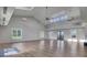 Open clubhouse interior featuring neutral paint, lots of windows for natural light, and luxury vinyl floors at 716 Triangle Ln, Summerville, SC 29486