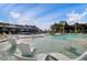 Resort-style pool features in-water loungers, ample seating, and a spacious sun deck at 716 Triangle Ln, Summerville, SC 29486