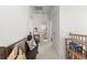 Hallway with carpeted floors leading to a bathroom with a beautifully decorated shower curtain at 716 Triangle Ln, Summerville, SC 29486